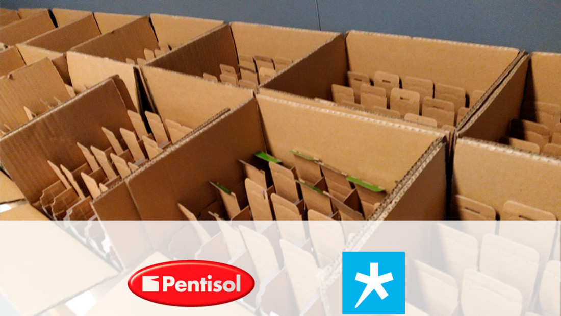 Pahvilaatikoita täynnä pienempiä pahvilaatikoita, etualalla Pentisolin ja Spesian logot.