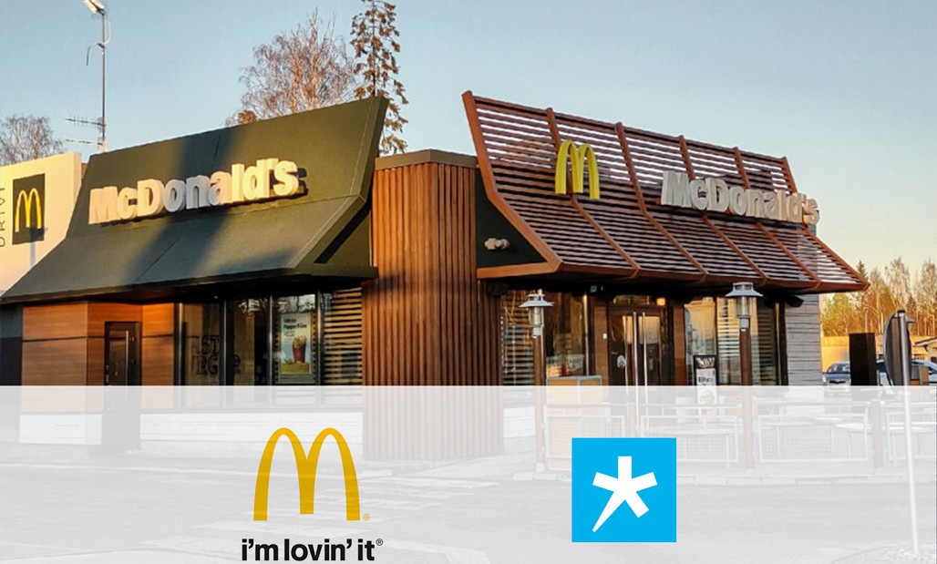 McDonaldin ravintola ja kuvan edustalla McDonaldsin ja Spesian logot yhteistyön merkiksi.